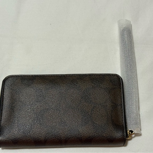 Coach Dark Brown Leather Wallet with interior flares. - Picture 2 of 3